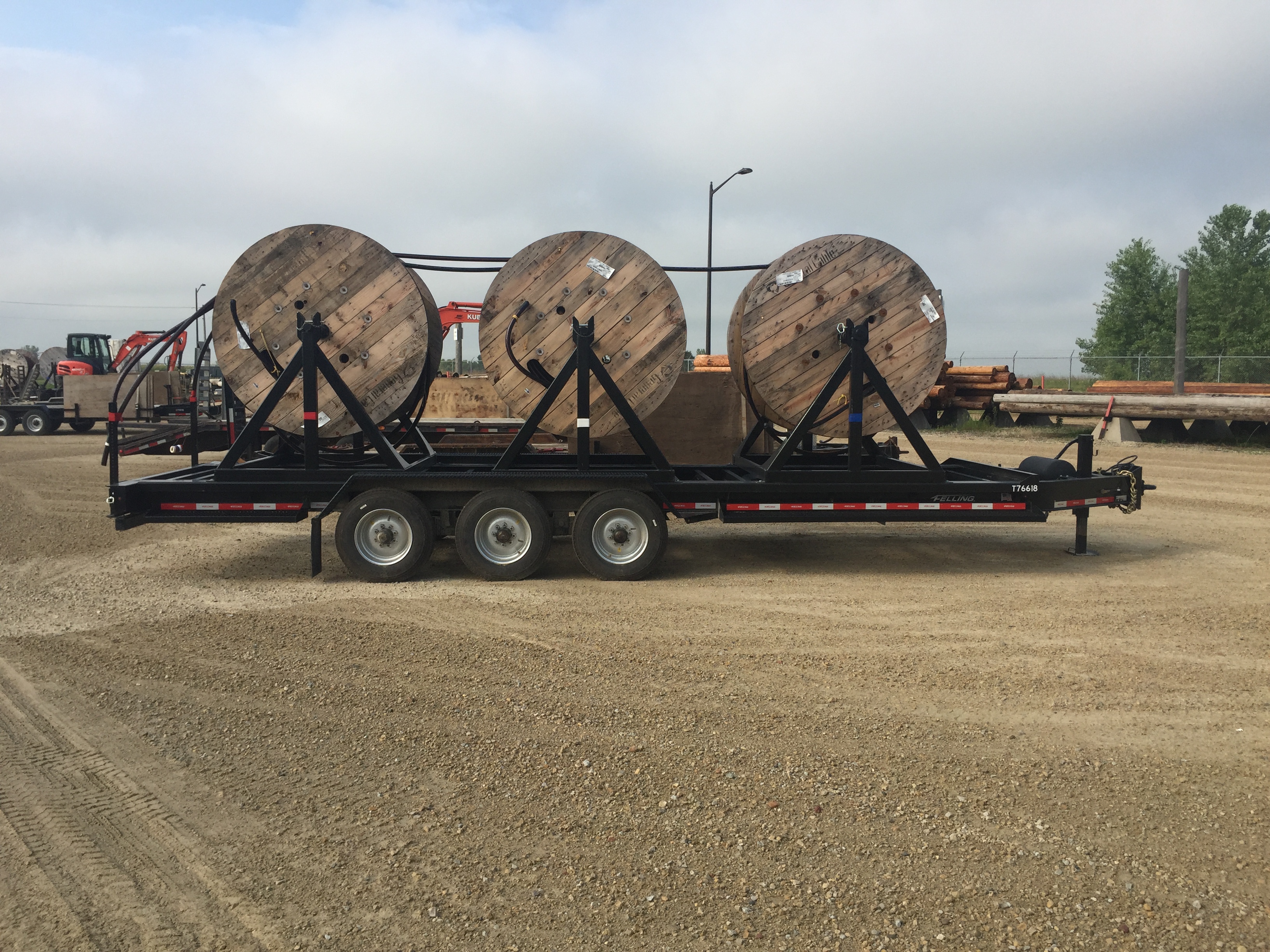 Felling's Triple Reel Trailer is Cooperative's Cable Deployment