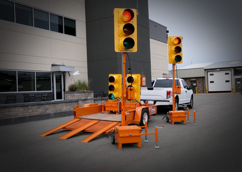 Portable Traffic Signal Systems loaded on a custom Felling FT-3 Utility Pan trailer.