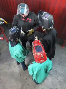 youth learn how to weld at felling trailers