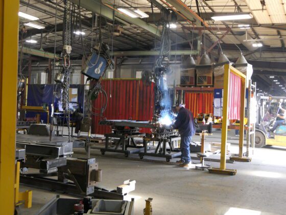 national weld month welder in shop