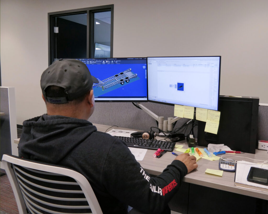 Rubén Carrillo working on a design on a computer